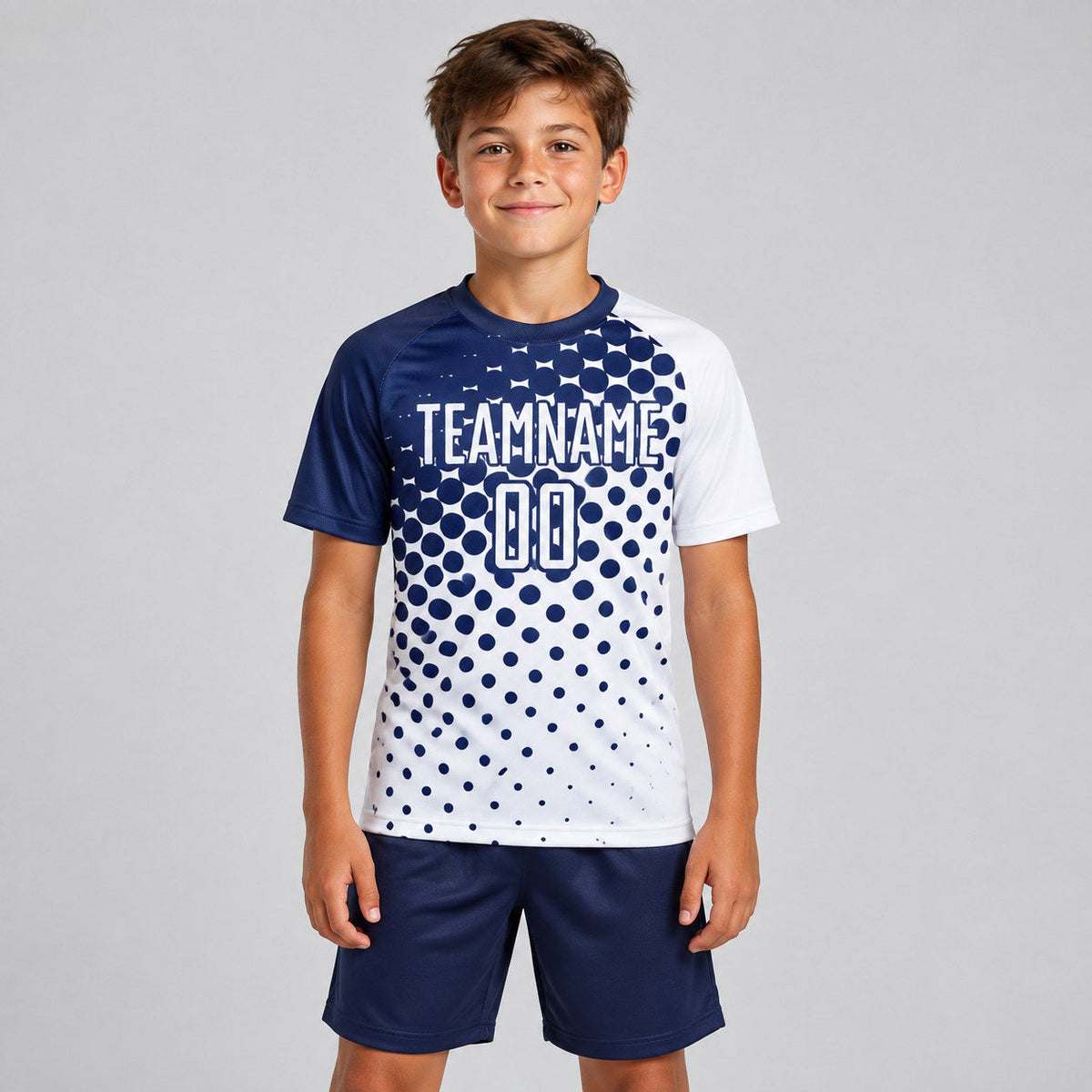 Custom White Modern Polka Dot Sublimated Soccer Jersey with Navy Lettering youth size worn by child model