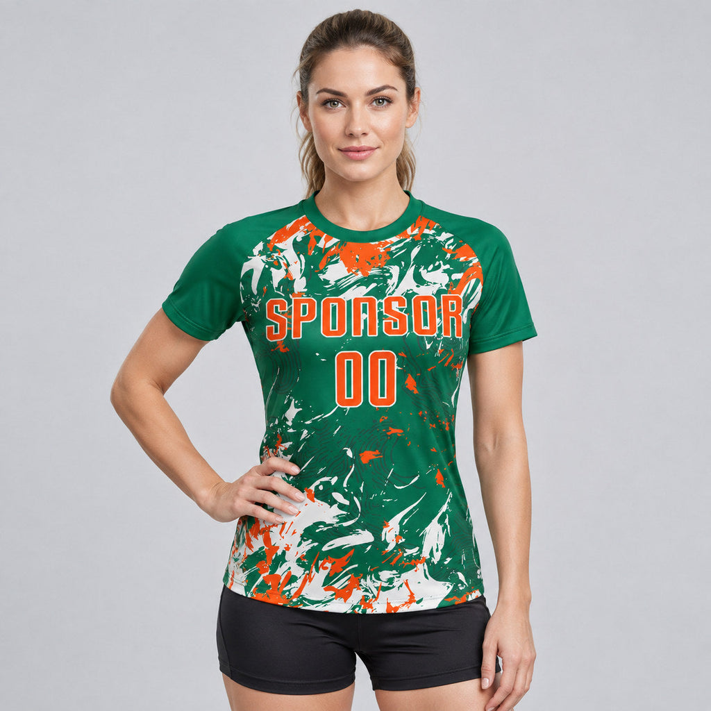 Custom Kelly Green Fluid Art Splash Sublimated Soccer Jersey with Orange and White Lettering worn by female model