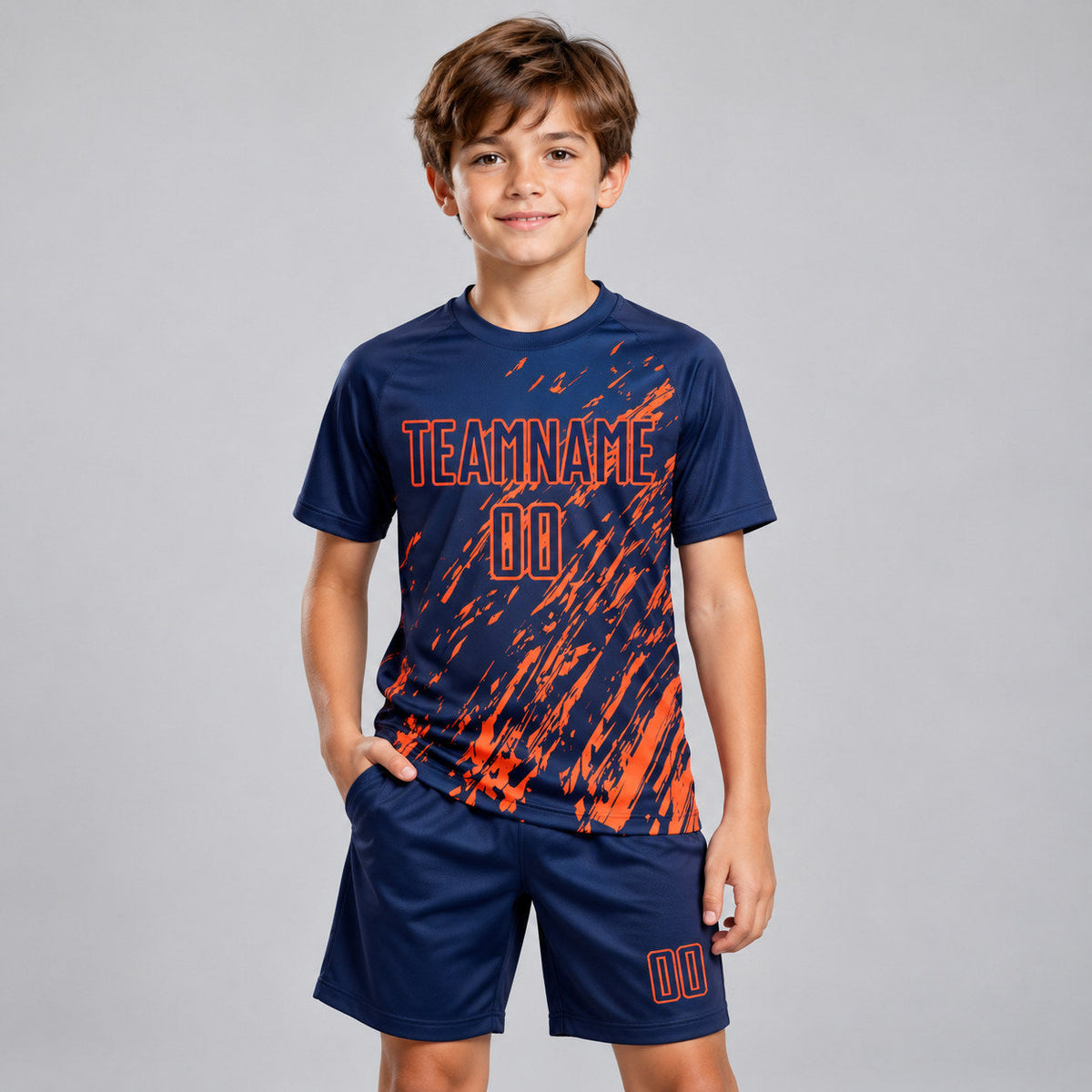 Custom Navy Splash Sublimated Soccer Jersey with Orange Lettering youth size worn by child model
