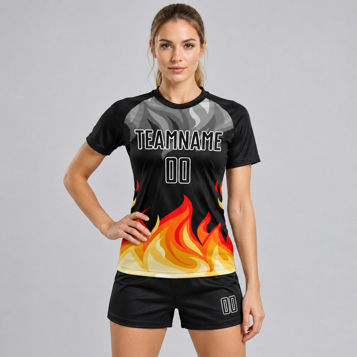 Custom Black and Gray Flame Sublimated Soccer Jersey with Red and Gold Lettering Design 1942 worn by female model