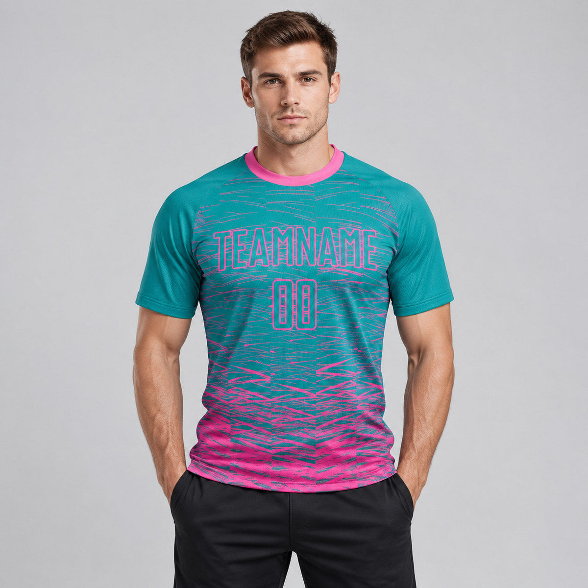 Custom Teal Sublimated Soccer Jersey with Pink Lettering worn by male model