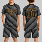 Custom Black Sublimated Soccer Jersey with Black and Old Gold Lettering Design 0005 youth size worn by child model