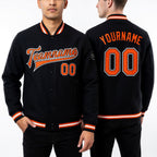 Custom Black Orange-White Bomber Full-Snap Varsity Letterman Jacket worn front and back