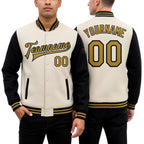 Custom Cream Old Gold-Black Bomber Full-Snap Varsity Letterman Two Tone Jacket worn front and back