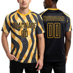 Custom Black Gold Animal Print Sublimation Soccer Uniform Jersey worn front and back