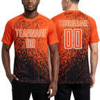 Custom Orange Black-White Abstract Fragment Art Sublimation Soccer Uniform Jersey worn front and back