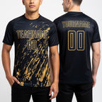 Custom Black Old Gold Splash Sublimation Soccer Uniform Jersey worn front and back